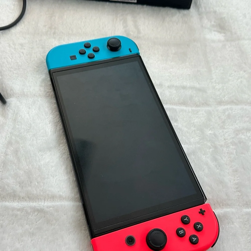 Nintendo Switch OLED with Joy-Con Controllers - Blue and Red